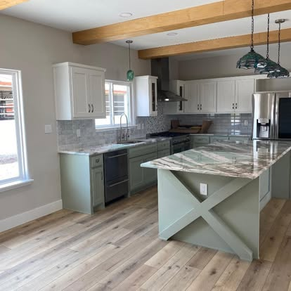 Spacious kitchen with wooden beams