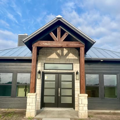 Wood-accented house entrance design